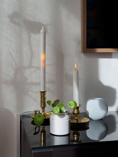 Lifestyle photo: the candle on a side table